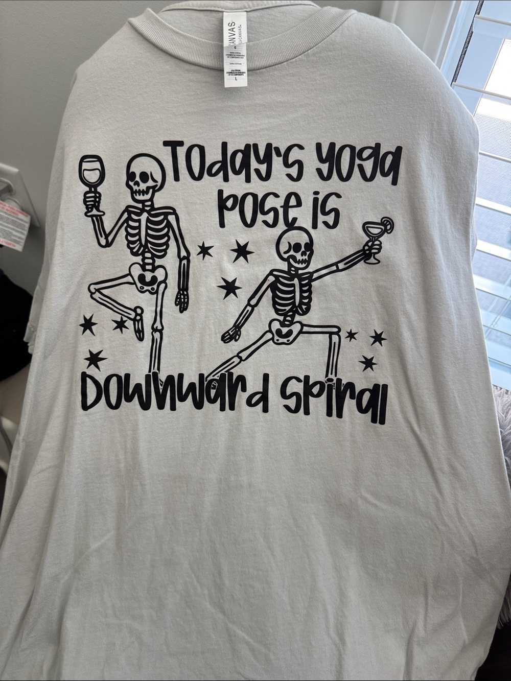 Bella Canvas White Short Sleeve Tee with Black Skeleton Yoga Graphic